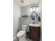 A modern bathroom with tile floors, a decorative sink and a nice vanity with good lighting at 6563 Enclave Blvd, Greenwood, IN 46143