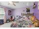 Inviting bedroom with decorative accents, plush bedding, and soft lighting creating a comfortable retreat at 6563 Enclave Blvd, Greenwood, IN 46143