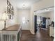 Inviting entryway featuring dark wood floors and stylish decor at 6563 Enclave Blvd, Greenwood, IN 46143