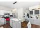 Modern kitchen with stainless steel appliances, center island and pendant lighting at 6563 Enclave Blvd, Greenwood, IN 46143