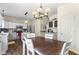 Bright eat-in kitchen with stainless steel appliances and a center island at 6563 Enclave Blvd, Greenwood, IN 46143