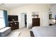 Spacious main bedroom featuring a large dresser, TV, and a comfortable bed at 6563 Enclave Blvd, Greenwood, IN 46143