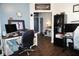 Functional office area featuring a modern desk setup, ample lighting, and stylish decor at 6563 Enclave Blvd, Greenwood, IN 46143