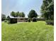 Well-maintained backyard with lush lawn and mature trees at 7150 Combs Rd, Indianapolis, IN 46237