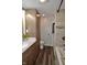 Updated bathroom featuring a vanity, toilet, and walk-in shower with modern tile at 7150 Combs Rd, Indianapolis, IN 46237