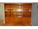 Close-up of built-in bookcase with cabinet storage beneath at 7150 Combs Rd, Indianapolis, IN 46237