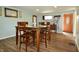 Inviting dining room with hardwood floors, table and chairs in a home at 7150 Combs Rd, Indianapolis, IN 46237