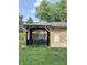 Covered patio perfect for outdoor entertaining with outdoor seating at 7150 Combs Rd, Indianapolis, IN 46237