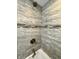 Close-up of the walk-in shower featuring modern tile and fixtures at 7150 Combs Rd, Indianapolis, IN 46237