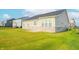 Spacious backyard with lush green grass and a fence at 7284 Bayview Run, McCordsville, IN 46055
