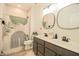 Stylish bathroom featuring double sinks, modern fixtures, and decorative shower curtain, offering both functionality and charm at 7284 Bayview Run, McCordsville, IN 46055