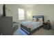 Cozy bedroom with plush furnishings, modern lighting, and a relaxing atmosphere, ideal for unwinding at 7284 Bayview Run, McCordsville, IN 46055