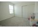 Bright bedroom with carpet, closet, and playroom, providing a versatile and comfortable space for children at 7284 Bayview Run, McCordsville, IN 46055