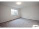 Bright bedroom showcasing neutral carpeting and natural light at 7284 Bayview Run, McCordsville, IN 46055