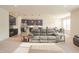Inviting open-concept living room showcasing modern kitchen and dining area at 7284 Bayview Run, McCordsville, IN 46055