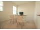 Home office space featuring two chairs, a built in desk, natural light, and neutral walls, perfect for remote work at 7284 Bayview Run, McCordsville, IN 46055