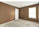 Bedroom features carpet, a window, and a white door at 7337 Wythe Dr, Noblesville, IN 46062