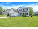 Charming two-story home with attached garage, manicured lawn, and a welcoming front porch at 7337 Wythe Dr, Noblesville, IN 46062