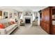 Inviting living room with a fireplace, comfortable seating and view into the kitchen at 8038 Sydney Ln, Avon, IN 46123