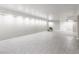 Spacious basement features modern gray flooring and neutral paint at 8117 Scarborough Ct, Indianapolis, IN 46256