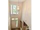 Grand entryway with large windows, stained glass, and modern light fixture at 8460 Brittany N Ct, Indianapolis, IN 46236