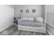 This bedroom has a cozy daybed and plenty of storage space, with a soothing decor for restful nights at 8864 S Tibbs Ave, Indianapolis, IN 46217