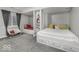 Cozy bedroom features built-in beds with drawer storage, creating a practical and charming sleeping space at 8864 S Tibbs Ave, Indianapolis, IN 46217