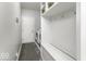 Well-organized mud room with storage and convenient laundry area at 8864 S Tibbs Ave, Indianapolis, IN 46217