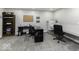 This spacious office provides ample desk space and storage for productivity and organization at 8864 S Tibbs Ave, Indianapolis, IN 46217