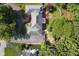 Aerial view of the home showcasing the roof, yard, trees, and general landscape at 9420 N Kenwood Ave, Indianapolis, IN 46260