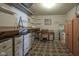 Finished basement featuring open space and storage shelving and cabinets at 9420 N Kenwood Ave, Indianapolis, IN 46260