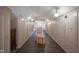 Spacious walk-in closet with custom shelving, hanging rods, chair, and ample storage space at 9420 N Kenwood Ave, Indianapolis, IN 46260