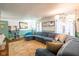 Spacious living room featuring a comfortable sectional sofa and bright natural light at 10622 Penn Dr, Indianapolis, IN 46280