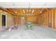 Interior of garage with lawnmower and tools at 10928 W Jackson St, Muncie, IN 47304