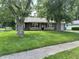 Charming single story home with well-manicured lawn and beautiful mature trees at 1108 Pierce Dr, Plainfield, IN 46168
