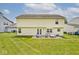 Expansive backyard with a patio area perfect for entertaining and enjoying the outdoors at 11320 Lynchburg Way, Indianapolis, IN 46229