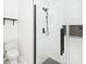 Close up of a stylish modern shower with black hardware, white subway tile, and mosaic accent wall at 11320 Lynchburg Way, Indianapolis, IN 46229