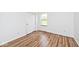 Bedroom featuring natural light, a closet and stylish wood-look floors at 11320 Lynchburg Way, Indianapolis, IN 46229