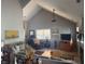 Open living room with high ceilings, large window, fireplace, neutral color scheme and plush furniture at 11632 Coastal Way, Indianapolis, IN 46229