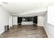 Finished basement showcases an open layout with vinyl floors and neutral color scheme at 117 Sawgrass Ct, Lebanon, IN 46052