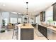 Spacious open concept kitchen with a large island and easy access to the living area at 117 Sawgrass Ct, Lebanon, IN 46052