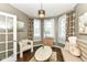 Cozy living room showcasing warm colors, bay windows, and stylish decor at 117 Sawgrass Ct, Lebanon, IN 46052