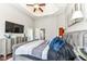 Comfortable bedroom with large television, ample closet space, and private access to the backyard at 117 Sawgrass Ct, Lebanon, IN 46052
