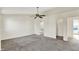 Primary bedroom features a ceiling fan with views of a bathroom and closet at 11961 Driftstone Dr, Fishers, IN 46037