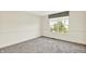 Bedroom with plush carpet, white walls with chair rail, and a large window with a valance at 11961 Driftstone Dr, Fishers, IN 46037
