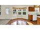 Kitchen area featuring a bay window for natural light and wooden cabinets at 11961 Driftstone Dr, Fishers, IN 46037