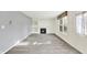 A bright living room featuring a fireplace at 11961 Driftstone Dr, Fishers, IN 46037