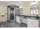 Full bathroom featuring dual sinks, granite countertop, and a glass-enclosed shower at 1207 Pickwick Pl, Indianapolis, IN 46208