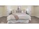 Comfortable primary bedroom featuring a king bed, side tables, and tasteful decor at 1207 Pickwick Pl, Indianapolis, IN 46208