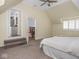 Bright bedroom with a view into the staircase and bathroom at 1207 Pickwick Pl, Indianapolis, IN 46208
